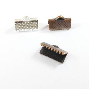 Ακροδέκτης  σκαλιστός μεταλλικός 13x6mm για κορδόνι πλακέ 13mm