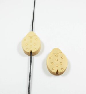 Πασχαλίτσα πλακέ ξύλινη φυσική χάντρα 23x19mm