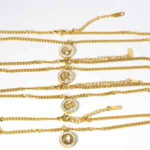 Ζώδιο χρυσό ατσάλι με στράς 13mm και γυριστή πλακέ χρυσή αλυσίδα ατσάλι 3mm μήκους 42cm και επέκταση 50mm