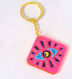 Μπρελόκ έτοιμο με Ιθάκη Evil Eye ρόμβος σε ρόζ neon plexiglass 54x54mm και χρυσό κρίκο μεταλλικό με αλυσίδα 30mm